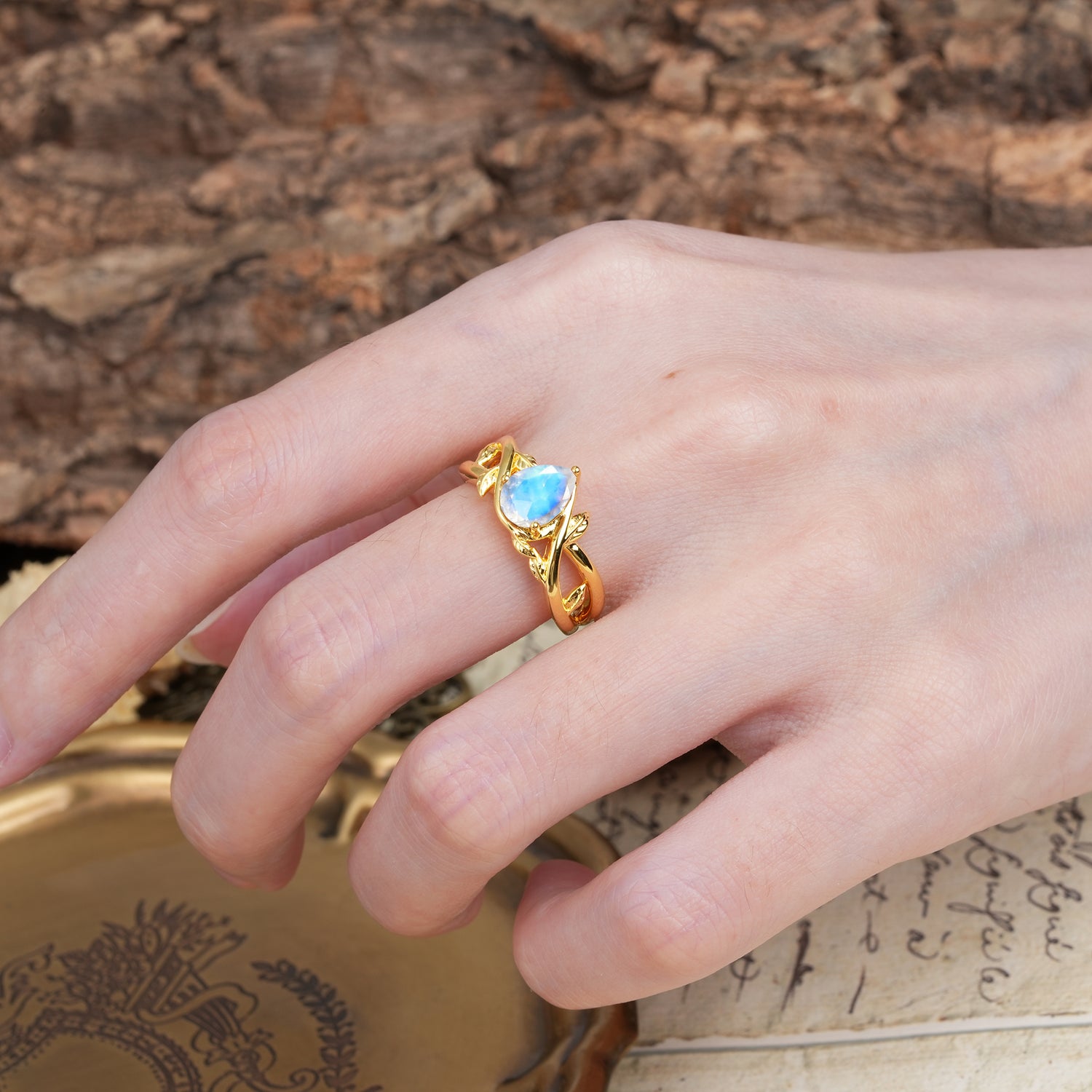 Nature-Inspired Classic Luxury: Entwined 3-Prong Pear Cut Moonstone Engagement Ring