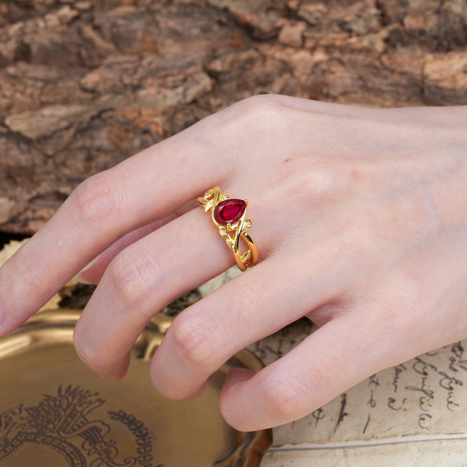Nature-Inspired Classic Luxury: Entwined 3-Prong Pear Cut Ruby Engagement Ring