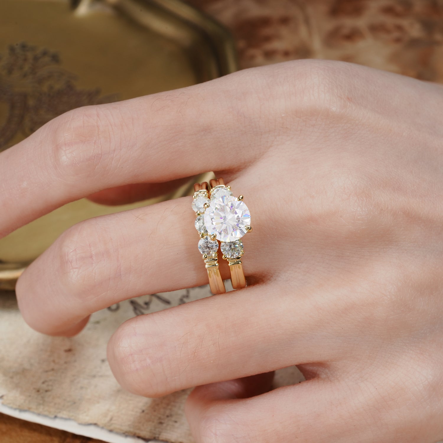 Unique and Elegant 4-Prong Round Cut Moissanite Three Stones Bridal Ring Set