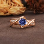 Unique and Elegant Twisted 6-Prong Round Cut Tanzanite Engagement Ring - Additional view