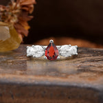 Unique and Elegant Twisted 3-Prong Pear Cut Garnet Engagement Ring - Additional view