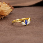 Unique, Minimalist 2-Prong Marquise Cut Tanzanite Three-Stone Wedding Ring - Additional view