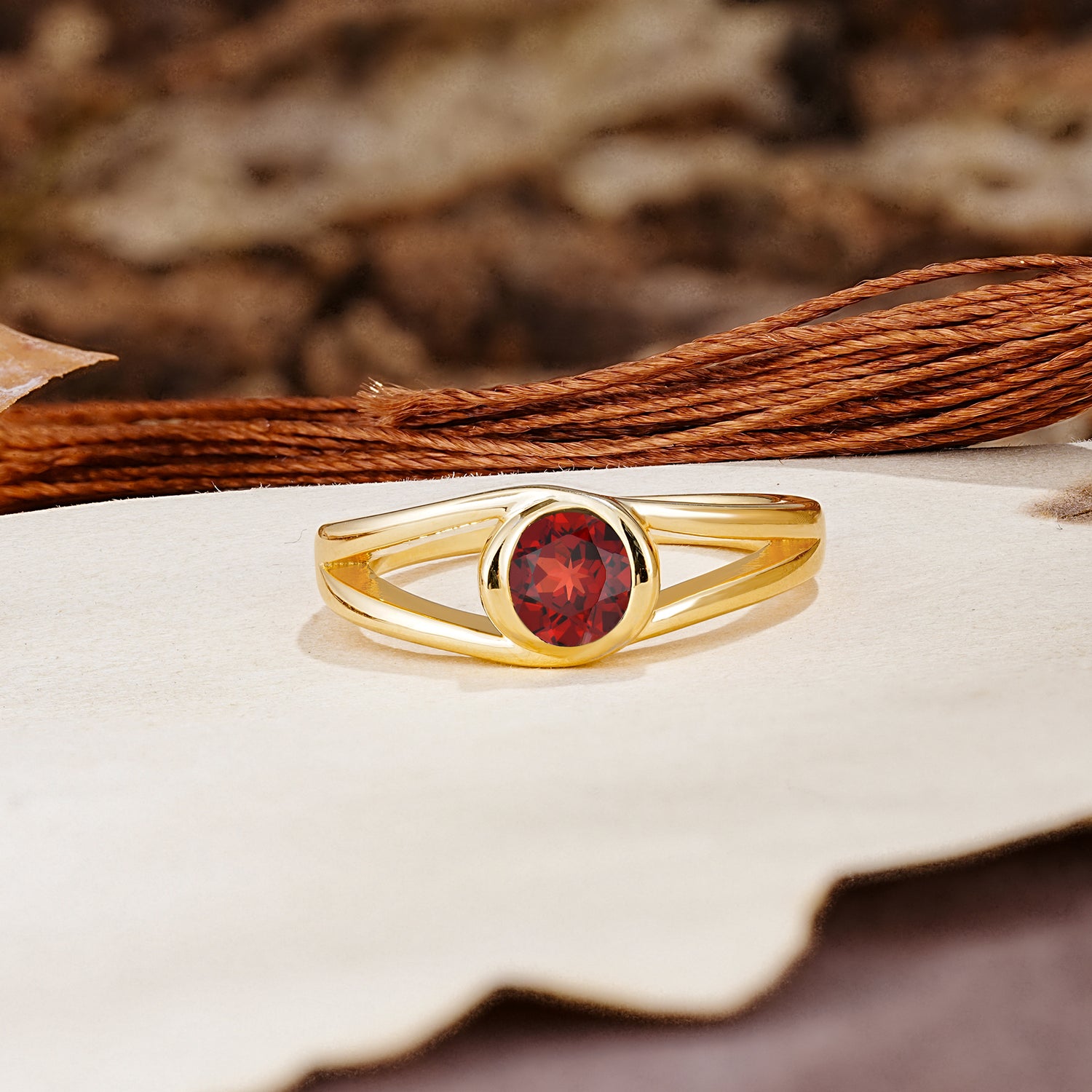 Unique Twisted-Wrap Round Cut Garnet Engagement Ring