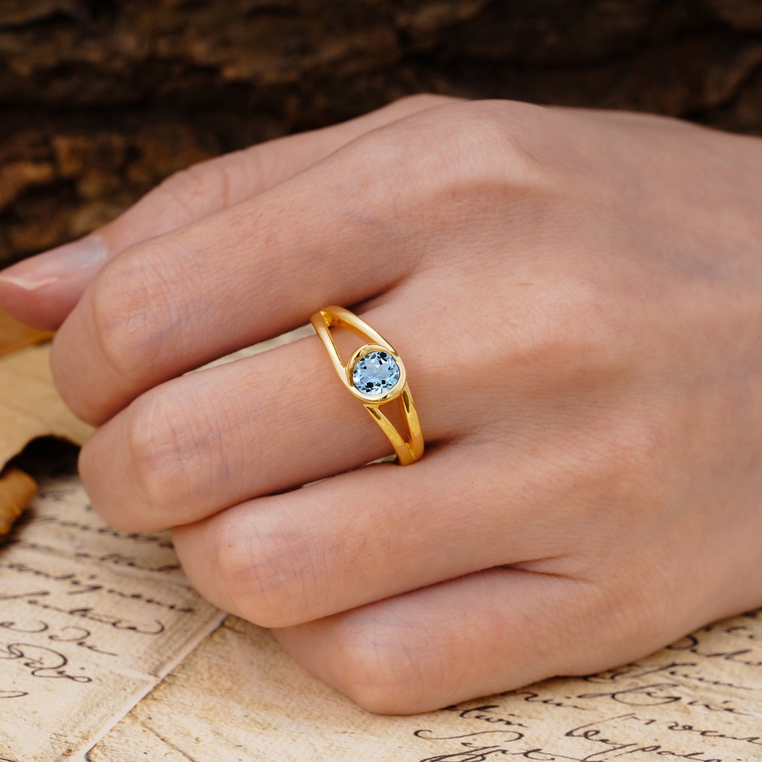 Unique Twisted-Wrap Round Cut Aquamarine Engagement Ring