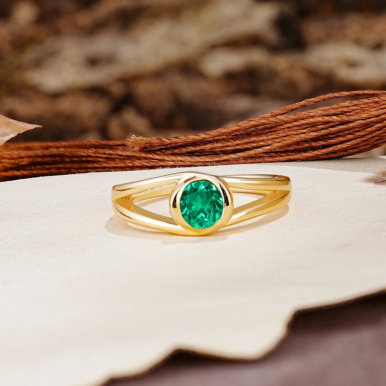 Unique Twisted-Wrap Round Cut Emerald Engagement Ring