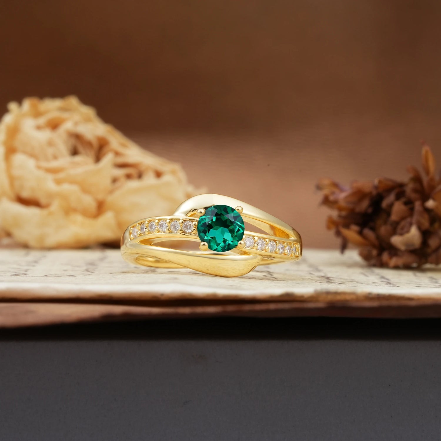Unique Intertwined 4-Prong Round Cut Emerald Engagement Ring