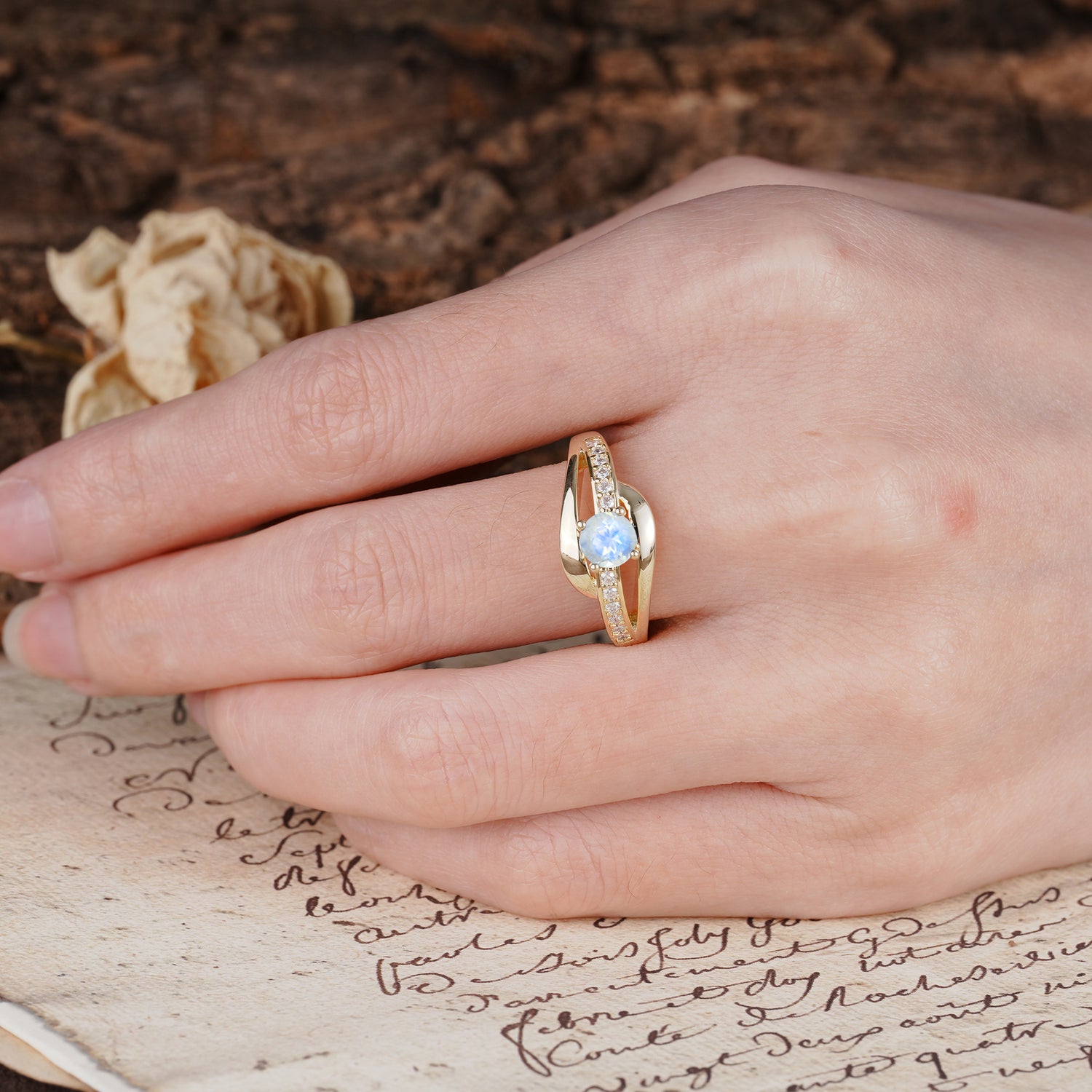 Unique Intertwined 4-Prong Round Cut Moonstone Engagement Ring