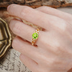 Nature-Inspired, Uniquely Intertwined 4-Prong Round Cut Peridot Engagement Ring - Additional view