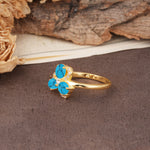 Unique Windmill-Flower Shape, 2-Prong Oval Cut Turquoise Wedding Ring - Additional view
