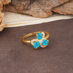 Unique Windmill-Flower Shape, 2-Prong Oval Cut Turquoise Wedding Ring - Additional view