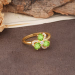 Unique Windmill-Flower Shape, 2-Prong Oval Cut Peridot Wedding Ring - Additional view