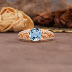 Luxurious and Unique, Entwined 4-Prong Round Cut Aquamarine Engagement Ring - Additional view