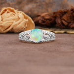 Luxurious and Unique, Entwined 4-Prong Round Cut Fire Opal Engagement Ring - Additional view