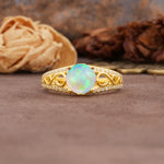 Luxurious and Unique, Entwined 4-Prong Round Cut Fire Opal Engagement Ring - Additional view