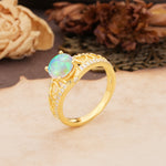 Luxurious and Unique, Entwined 4-Prong Round Cut Fire Opal Engagement Ring - Additional view