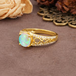 Luxurious and Unique, Entwined 4-Prong Round Cut Fire Opal Engagement Ring - Additional view