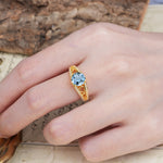 Luxurious and Unique, Entwined 4-Prong Round Cut Aquamarine Engagement Ring - Additional view