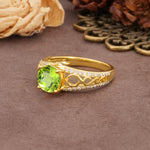 Luxurious and Unique, Entwined 4-Prong Round Cut Peridot Engagement Ring - Additional view