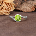 Unique Twisted, Entwined Round Cut Peridot Engagement Ring - Additional view
