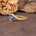 Unique Twisted, Entwined Round Cut Tanzanite Engagement Ring - Additional view