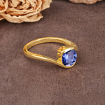 Unique Twisted, Entwined Round Cut Tanzanite Engagement Ring - Additional view
