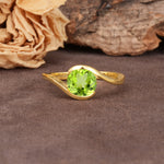 Unique Twisted, Entwined Round Cut Peridot Engagement Ring - Additional view