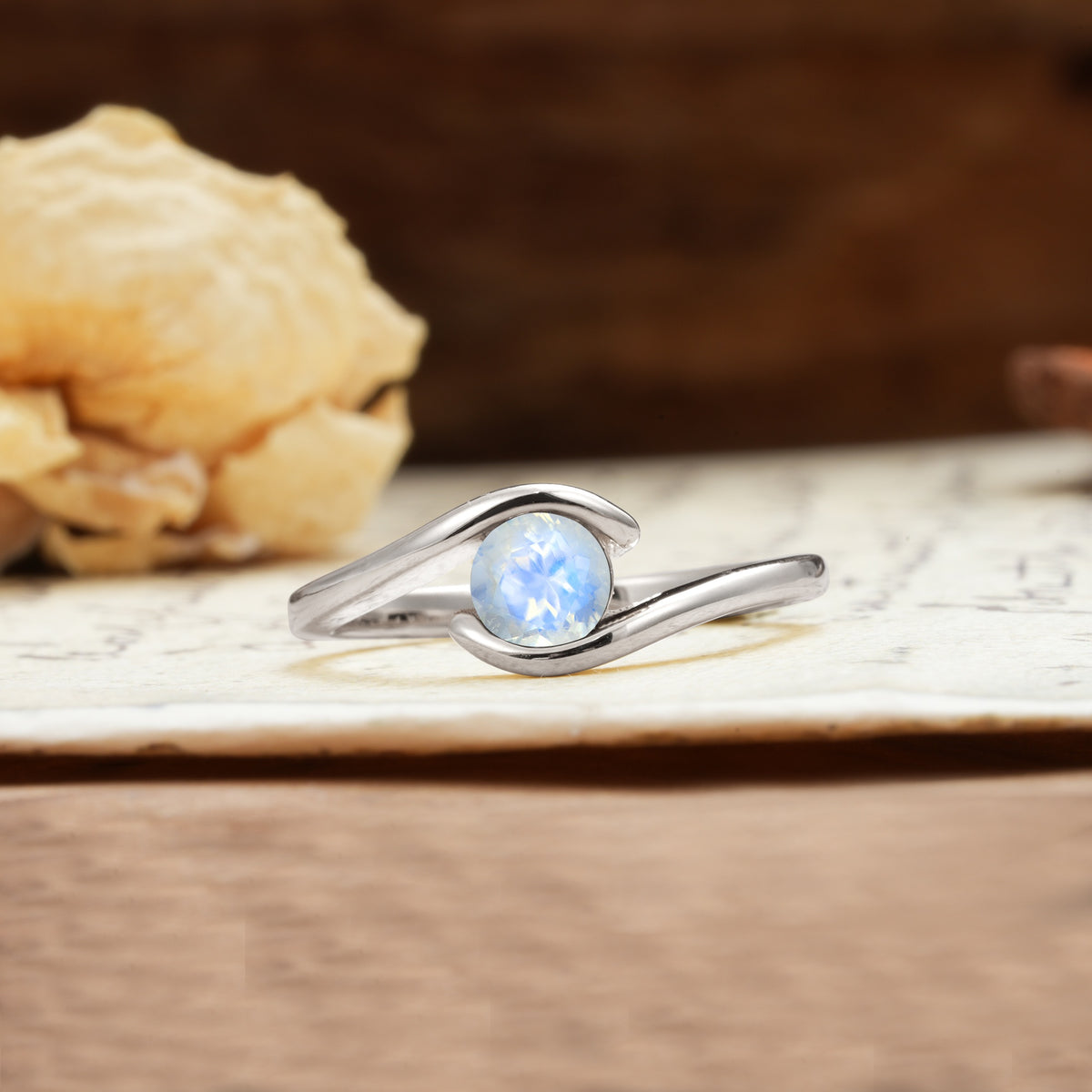 Unique, Minimalist, and Intertwined Round Cut Moonstone Engagement Ring - Additional view
