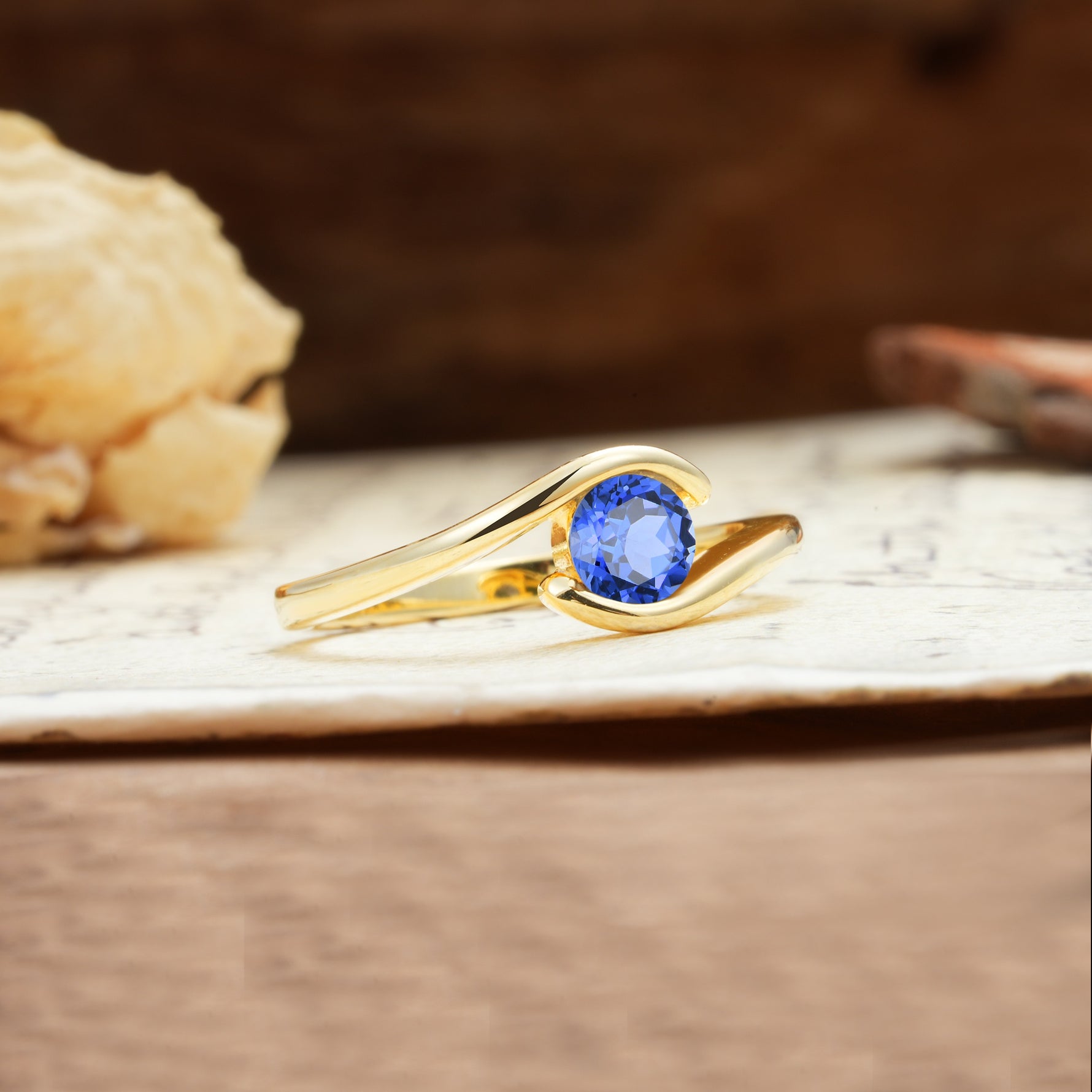 Unique, Minimalist, and Intertwined Round Cut Sapphire Engagement Ring - Additional view