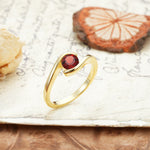 Unique, Minimalist, and Intertwined Round Cut Garnet Engagement Ring - Additional view