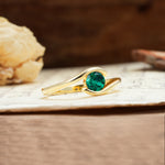 Unique, Minimalist, and Intertwined Round Cut Emerald Engagement Ring - Additional view