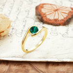 Unique, Minimalist, and Intertwined Round Cut Emerald Engagement Ring - Additional view