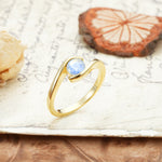 Unique, Minimalist, and Intertwined Round Cut Moonstone Engagement Ring - Additional view