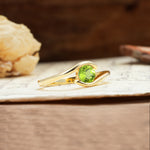 Unique, Minimalist, and Intertwined Round Cut Peridot Engagement Ring - Additional view