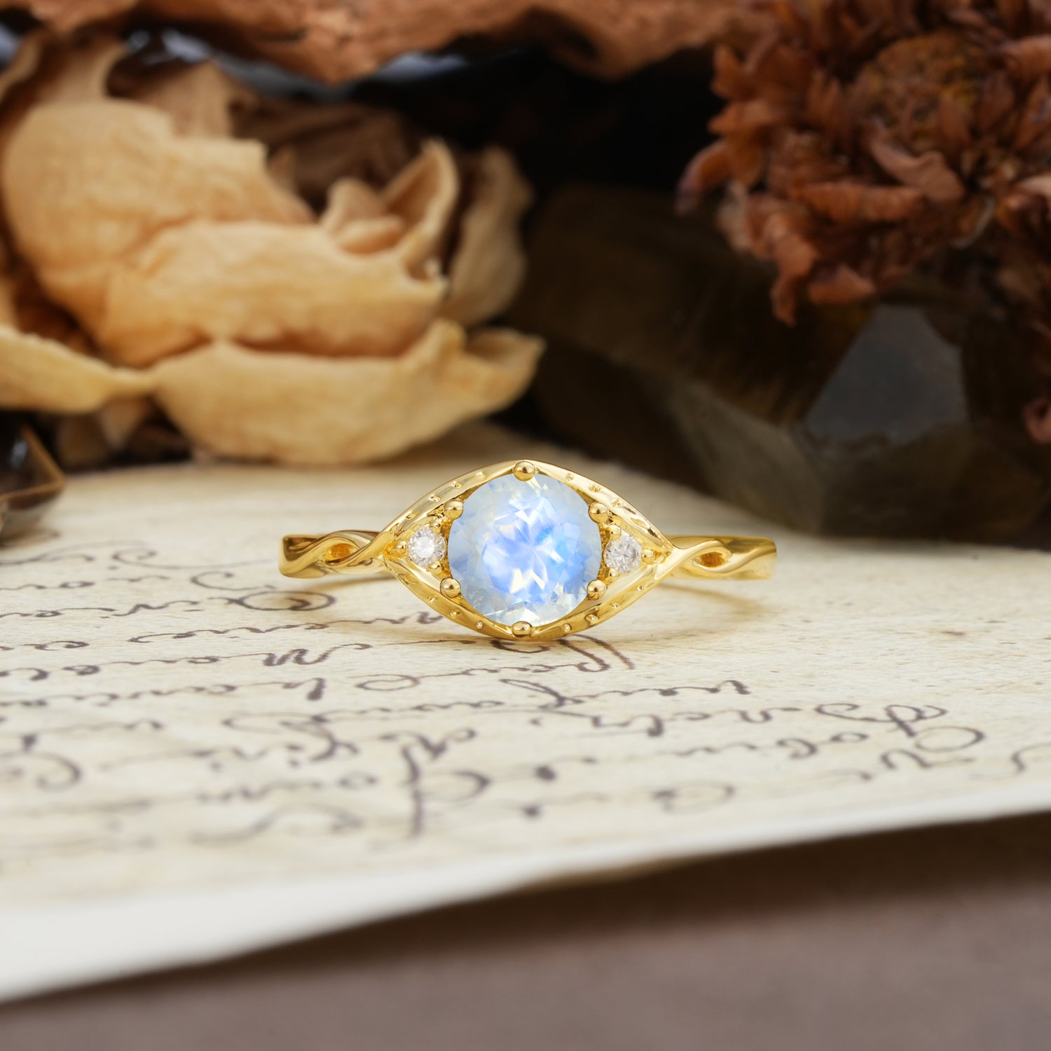 Retro Twisted Demon's Eye — 6-Prong Round Cut Moonstone Engagement Ring