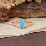 Unique and Luxurious 4-Prong Emerald Cut Turquoise Engagement Ring - Additional view