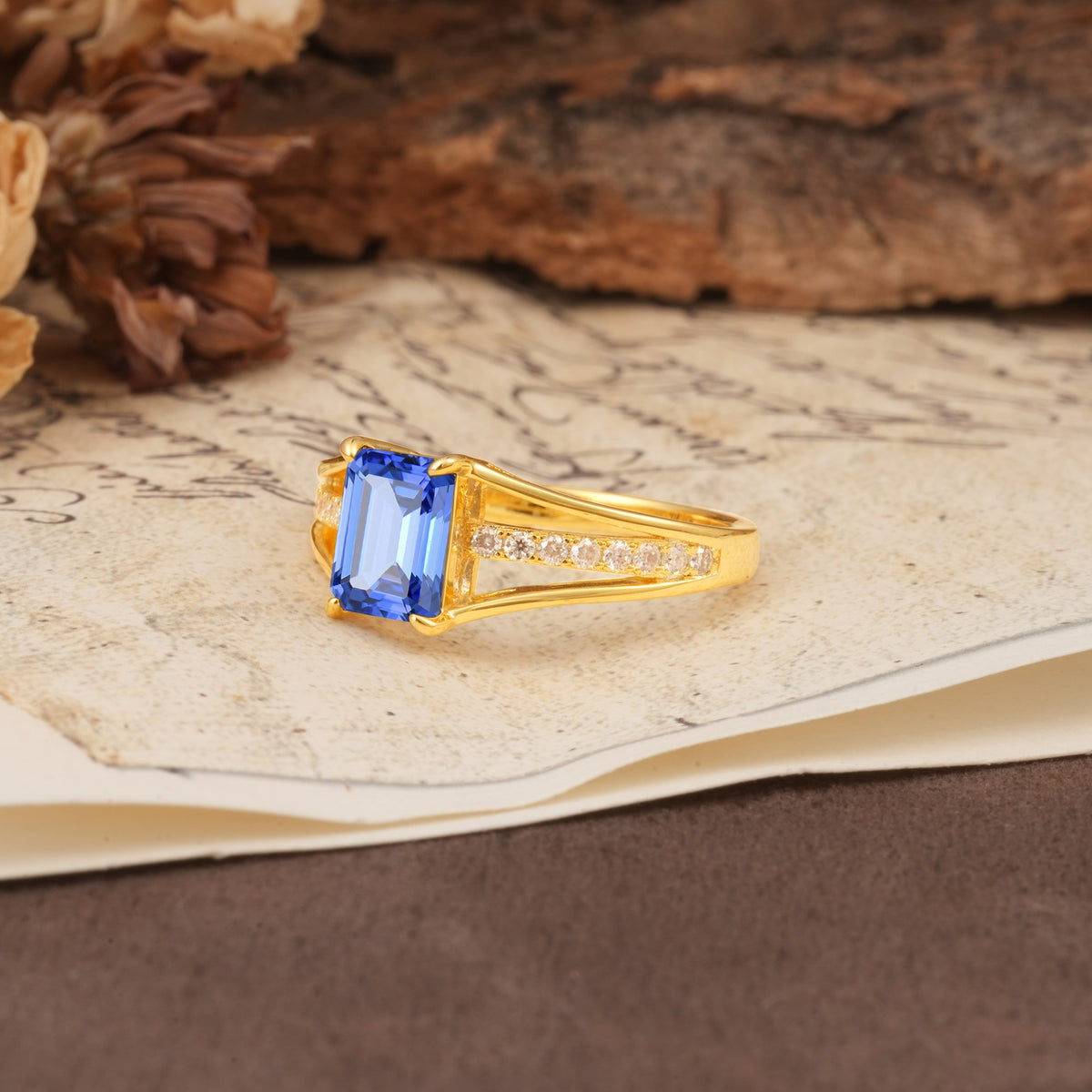 Unique and Luxurious 4-Prong Emerald Cut Sapphire Engagement Ring - Additional view