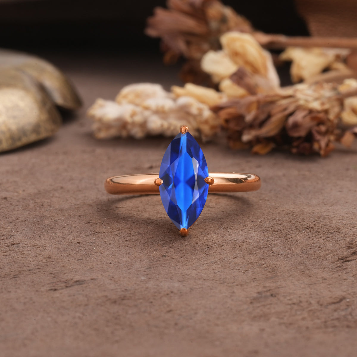 Unique and Luxurious 4-Prong Marquise Cut Sapphire Engagement Ring - Additional view