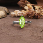 Unique and Luxurious 4-Prong Marquise Cut Peridot Engagement Ring - Additional view