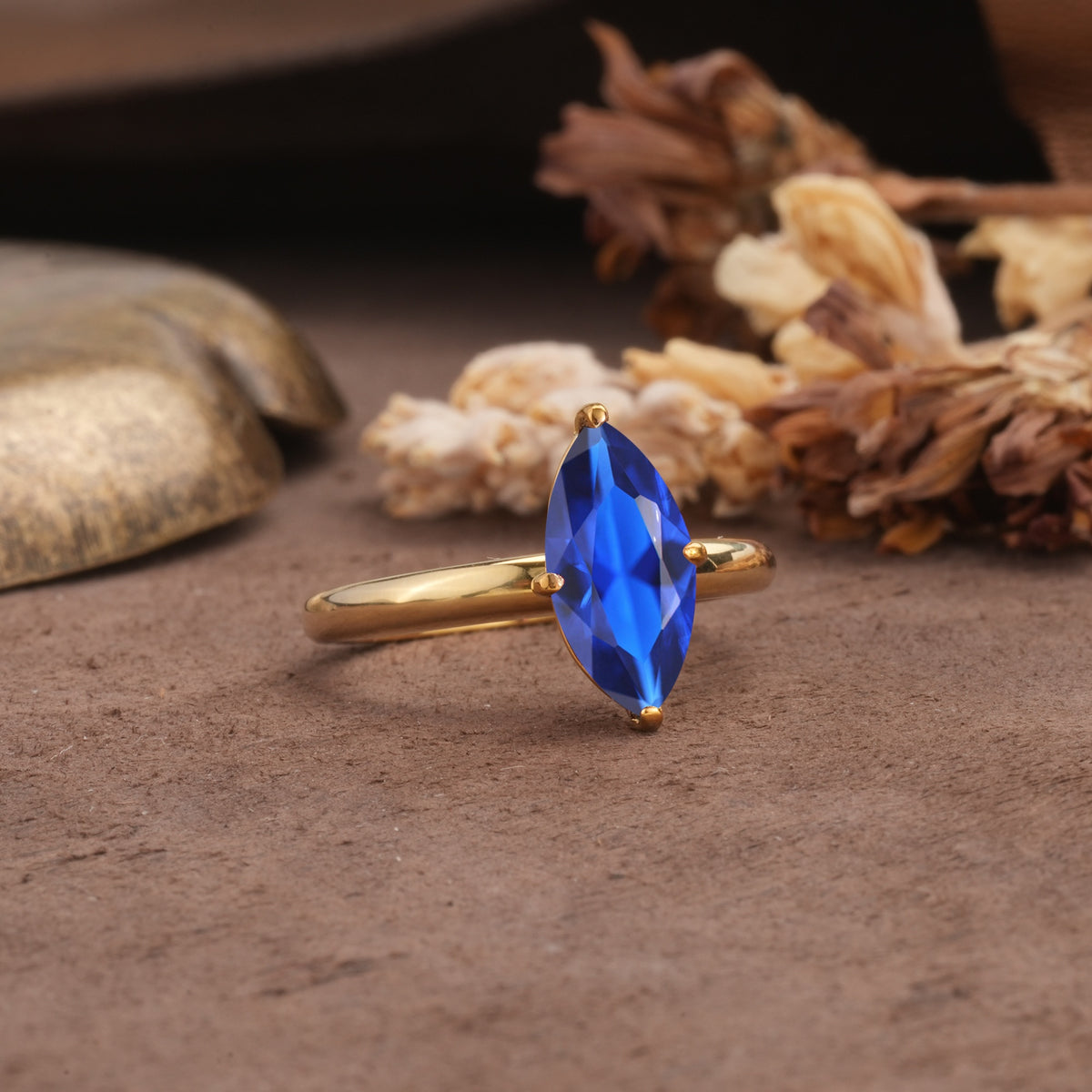 Unique and Luxurious 4-Prong Marquise Cut Sapphire Engagement Ring - Additional view