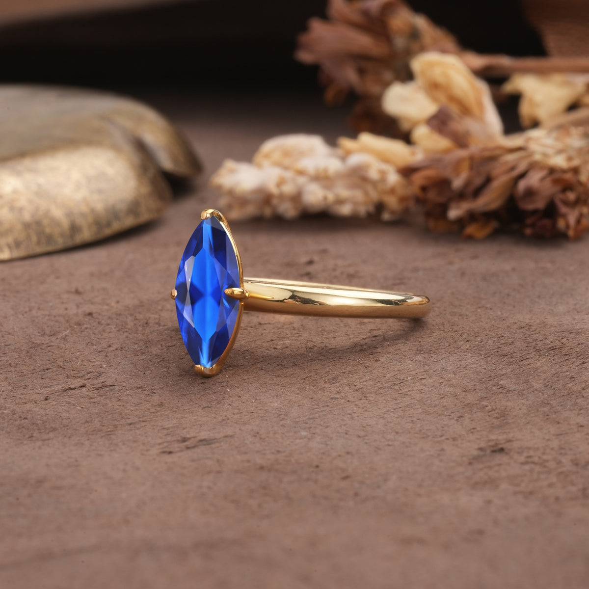 Unique and Luxurious 4-Prong Marquise Cut Sapphire Engagement Ring - Additional view