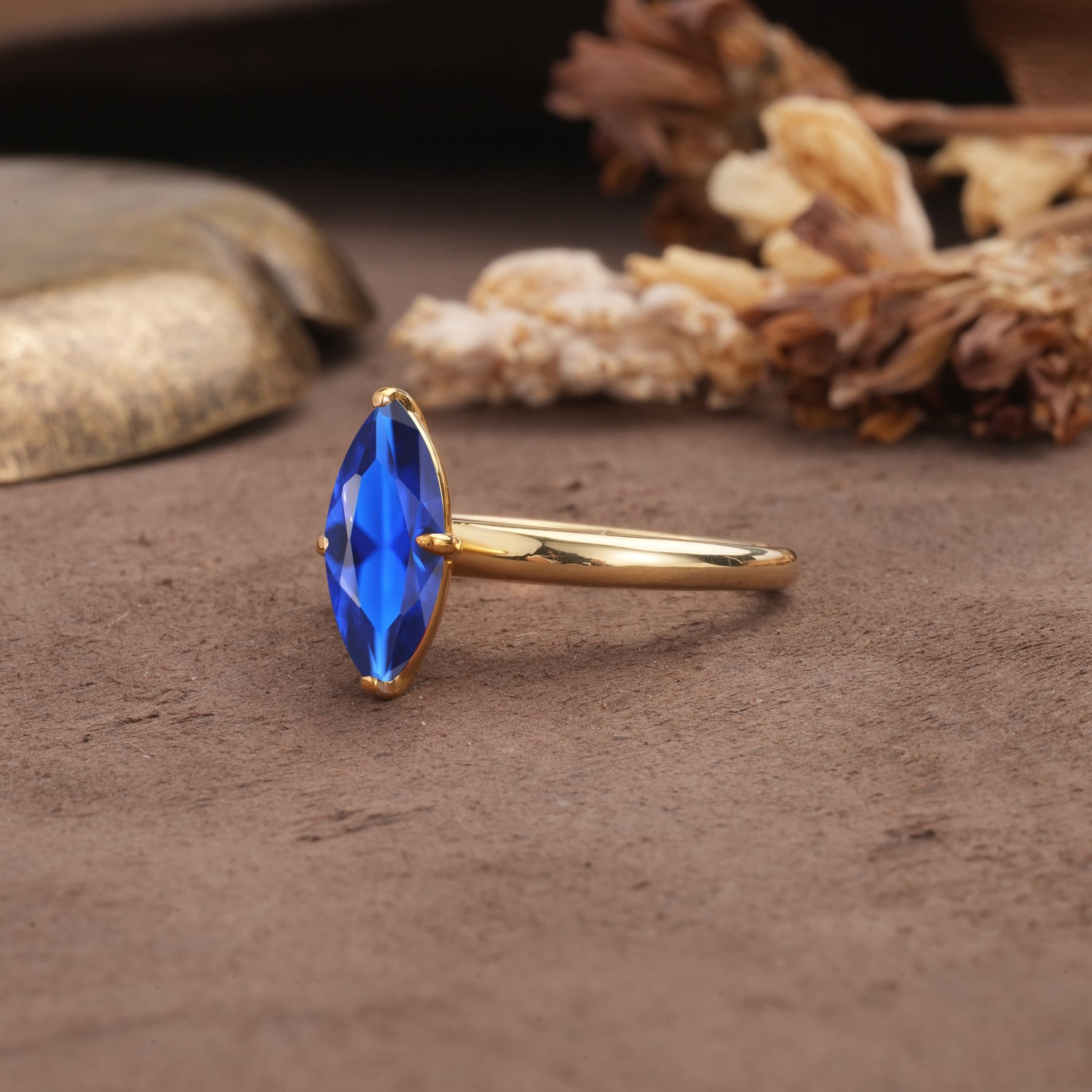 Unique and Luxurious 4-Prong Marquise Cut Sapphire Engagement Ring - Additional view