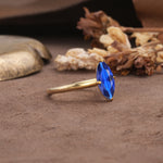 Unique and Luxurious 4-Prong Marquise Cut Sapphire Engagement Ring - Additional view