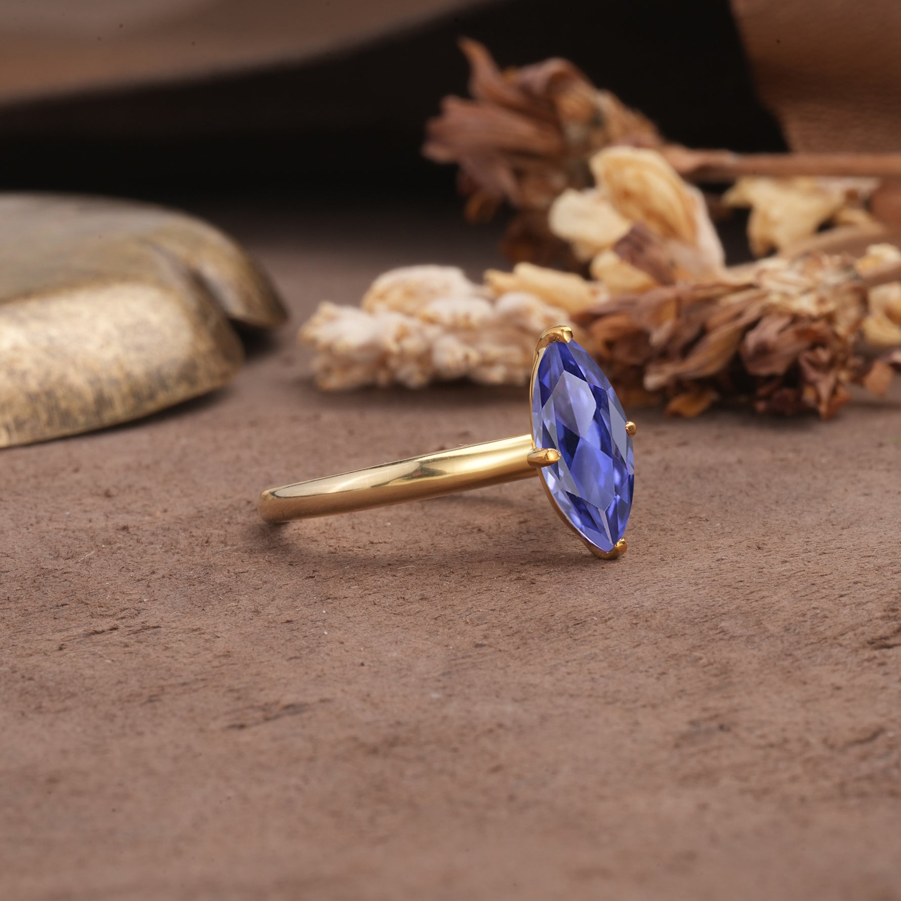 Unique and Luxurious 4-Prong Marquise Cut Tanzanite Engagement Ring - Additional view