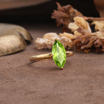 Unique and Luxurious 4-Prong Marquise Cut Peridot Engagement Ring - Additional view