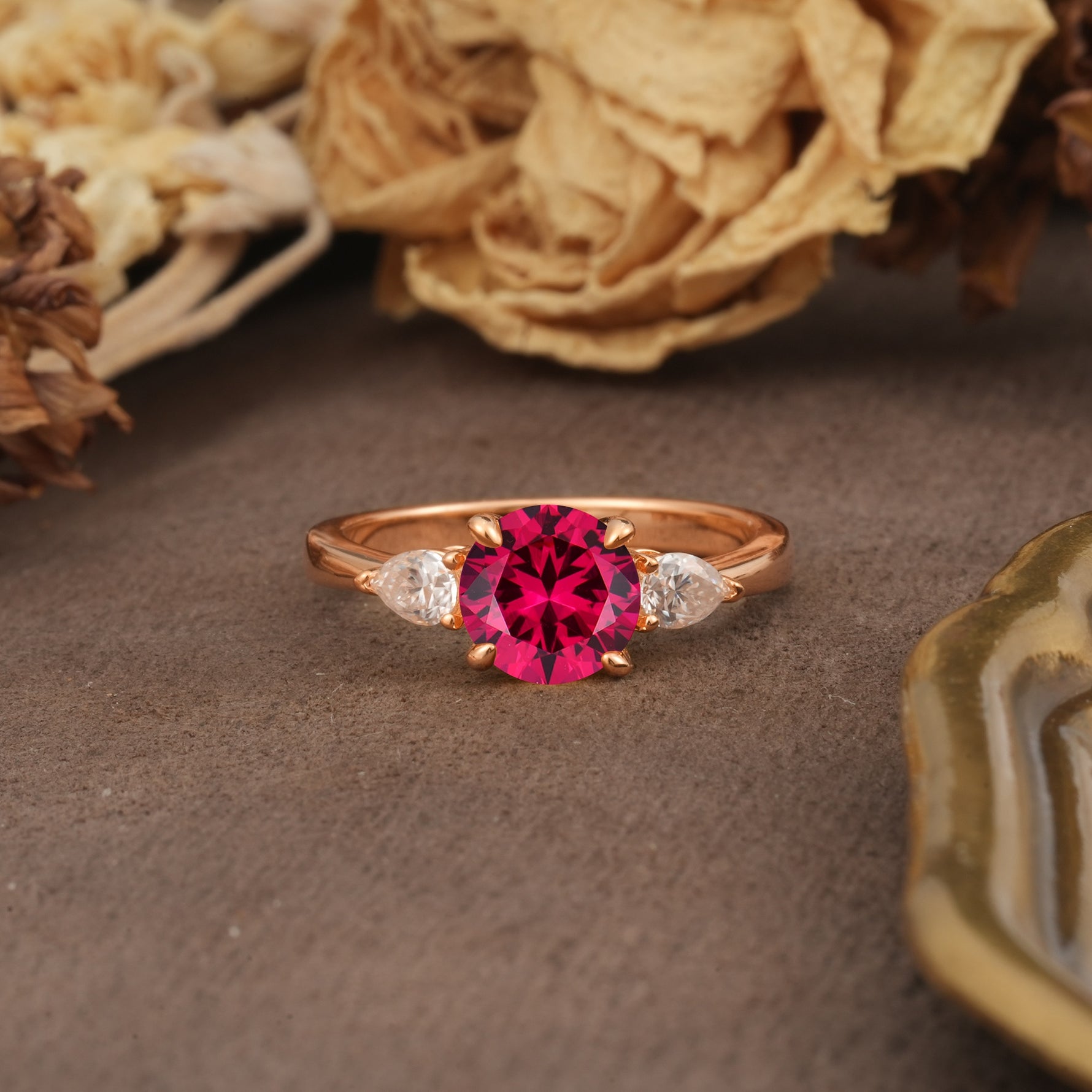 Classic, Luxurious 4-Prong Pear Cut Ruby Three Stone Engagement Ring - Additional view