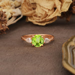 Classic, Luxurious 4-Prong Pear Cut Peridot Three Stone Engagement Ring - Additional view