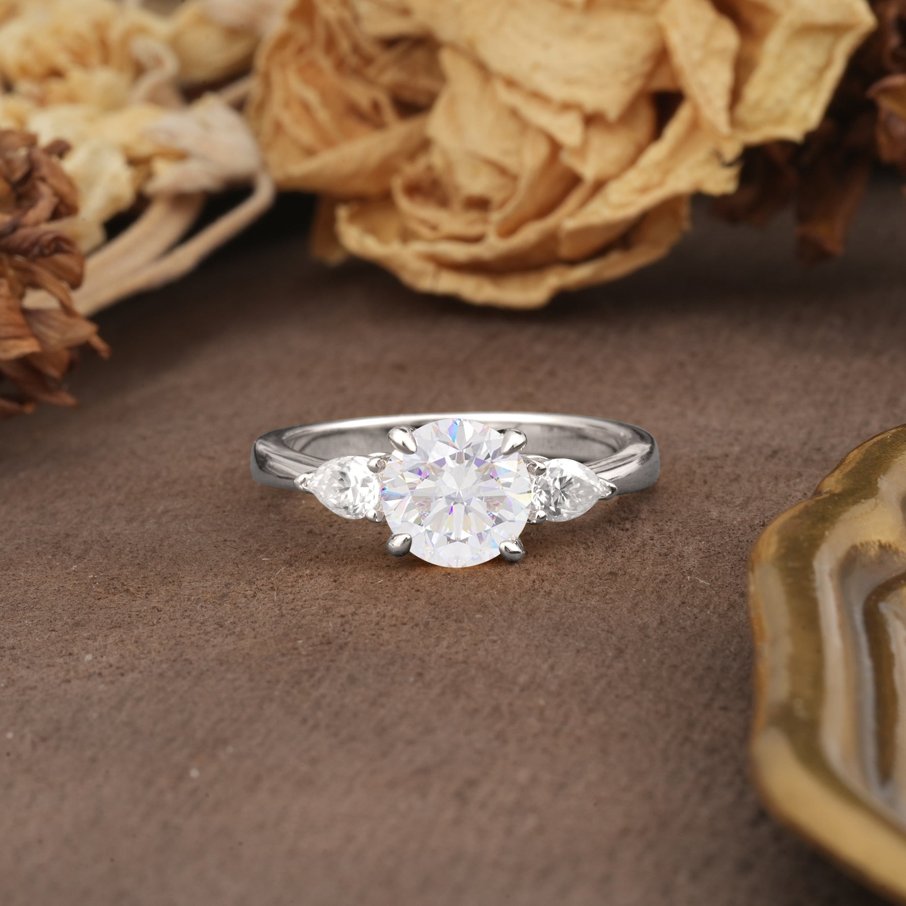 Classic, Luxurious 4-Prong Pear Cut Moissanite Three Stone Engagement Ring - Additional view