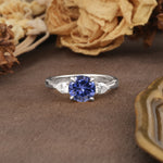 Classic, Luxurious 4-Prong Pear Cut Tanzanite Three Stone Engagement Ring - Additional view