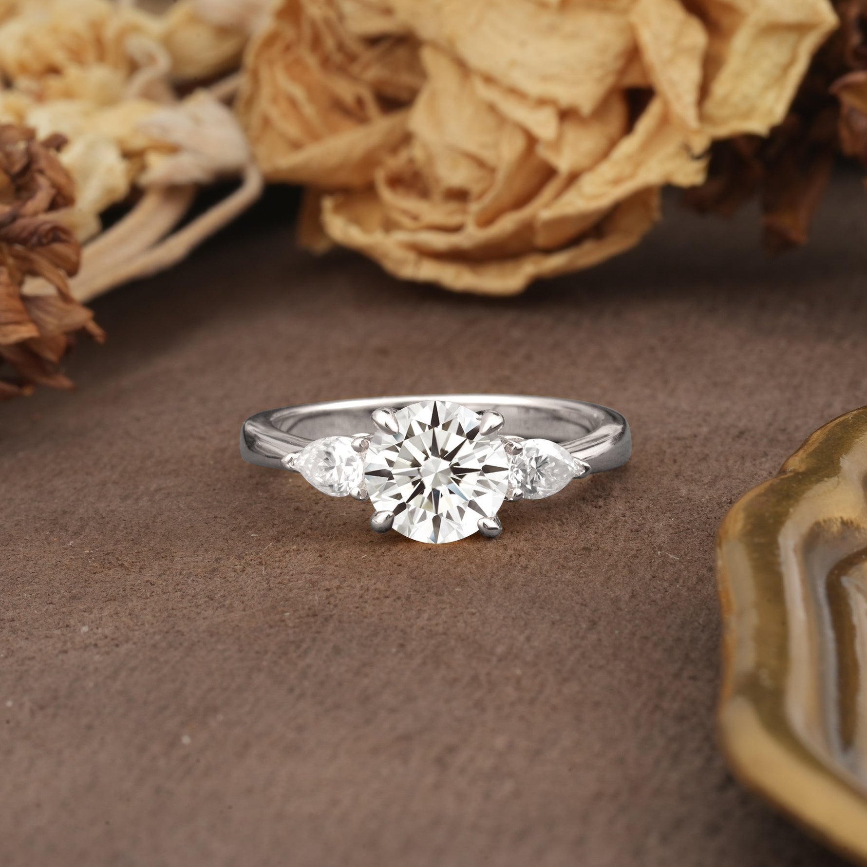 Classic, Luxurious 4-Prong Pear Cut Lab Diamond Three Stone Engagement Ring - Additional view