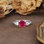 Classic, Luxurious 4-Prong Pear Cut Ruby Three Stone Engagement Ring - Additional view